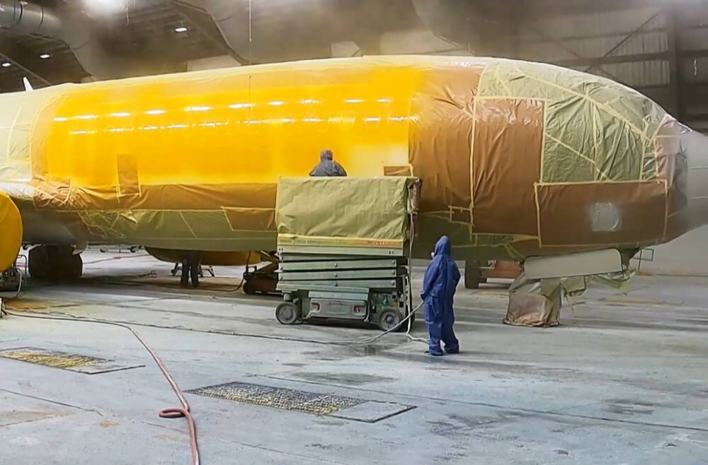 An aircraft being painted at Chennault International Airport